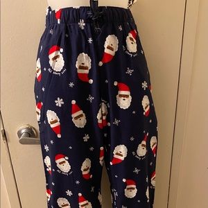 Old navy flannel Christmas pajamas pants with Santa Claus face